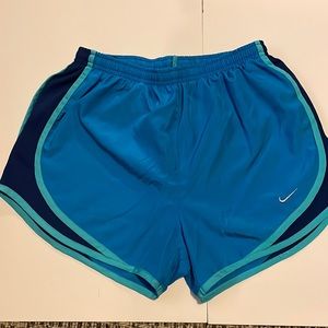 Nike Women's Blue Athletic Shorts with Teal Trim